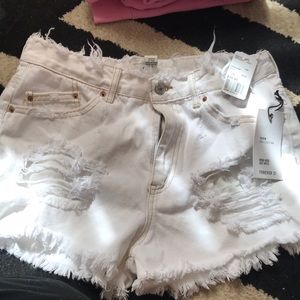 White distressed jean shorts